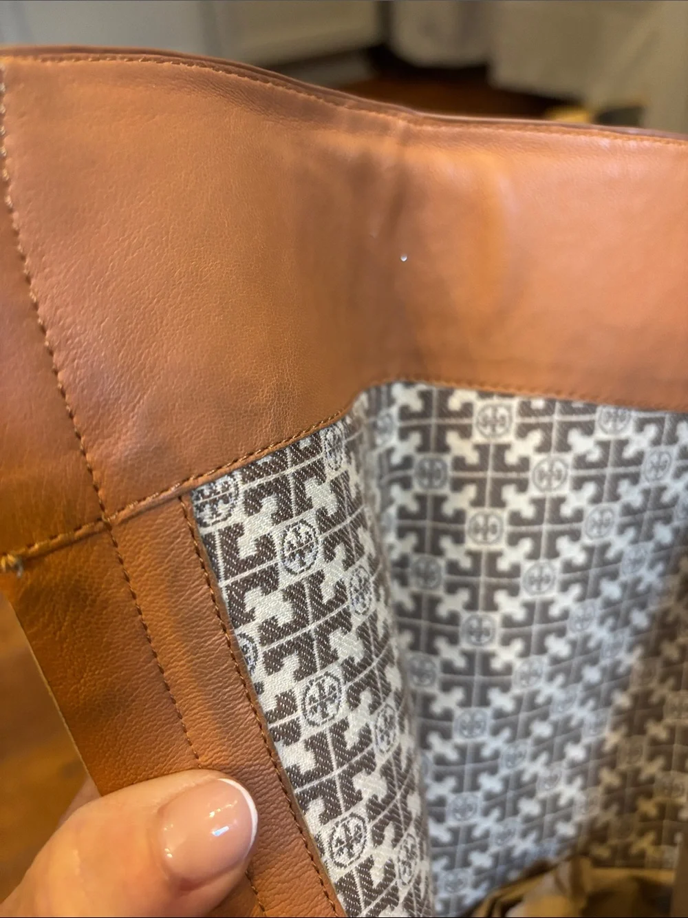 Tory Burch Brooke knee-high boots in tan leather. 11
